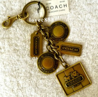 92186 Coach Brass Bleecker Charm KF antique brass snap 92187.jpg