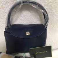 longchamp_le_pliage_cuir_1513943495_37dd7927.jpg