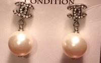 chanel earrings front.jpg