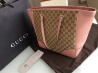 gucci-handtasche-aus-leder-canvas-e94e00.jpeg