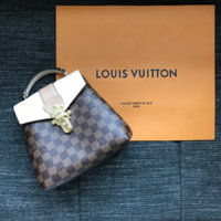 Louis Vuitton Clapton backpack beige