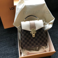 Louis Vuitton Clapton backpack beige