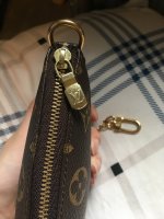 Louis Vuitton, I bought this Félicie Pochette online and the button  arrived like this