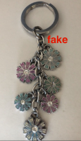 coach 1810 multi daisy enamel keychain FAKE front bappitybap.png