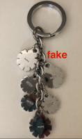 coach 1810 multi daisy enamel keychain FAKE back bappitybap.png