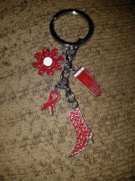 staceyshaffer fake coach BCA red keychain listed 3 times and removed.jpg
