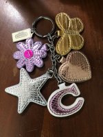 toystorynutty fake coach keychain butterfly flower heart star C 1.jpg