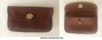 Coach turnlock pouch logo upper right under flap front and open.png