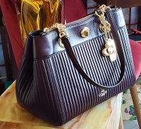 Coach Turnlock Edie Quilted Oxblood Nappa.jpg