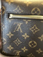 Exchanged my Pochette Metis - did I get a used one? The zipper is