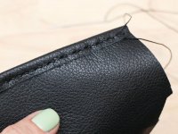 hand sewn leather edge binding.jpg