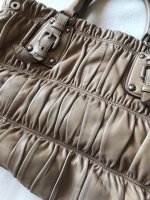 prada_gauffre_handbag_in_camel_1549948391_23f2d1dc.jpg