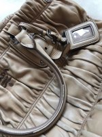 prada_gauffre_handbag_in_camel_1549948391_826cce6f.jpg