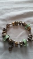 pandora with gold enamel muranos and chalcedony.jpg