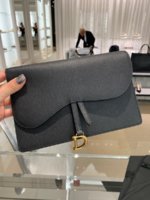 dior saddle calfskin clutch price