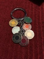touchofklass27 fake coach keychain snaphead discs.jpg