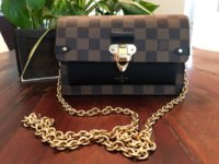 lv vavin chain wallet review