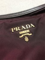 prada_saffiano_vernice_bordeaux_1549085188_8c7d610a.jpg