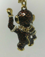 coach jeweled monkey back.jpg