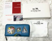 selected_store_tokyo fake coach wallet 10846 Nasa more fake props disney.jpg