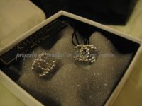 chanel earrings in box.jpg