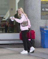 elle-fanning-at-airport-in-toronto-08-05-2019-4.jpg