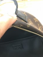 Pull tab darker than rest of bag…is this normal? : r/Louisvuitton