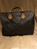 Brooke's Boutique - Classic LV Speedy 35, retails $1620, was $799.99, now  $719.99! normal signs of vintage wear, slight darkening on patina leather.  Missing Leather Tab on Zipper. Please note that the