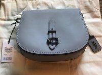 Coach Saddle with rivets 1.jpg