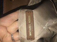 where is the serial number on a michael kors purse