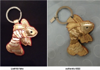 lia6163 fake vs authentic 6522 koi fish fob front.png