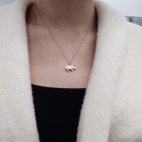 Gifted rose gold rhino charm -- worth 