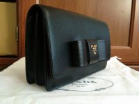 prada-lux-bow-black-saffiano-leather-cross-body-bag-1-1-960-960.jpg