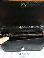 prada-lux-bow-black-saffiano-leather-cross-body-bag-5-1-960-960.jpg