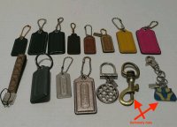 dgrunberg69 coach charm mix listing some fakes.jpg