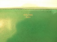 celine green zip around accordian wallet logo.jpeg