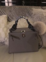 Louis Vuitton Why Knot MM Galet Mahina Silver Hardware – Madison Avenue  Couture