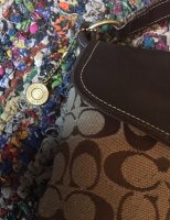 baileysbungalow fake coach misspelled creed hangtag.jpg