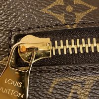 Exchanged my Pochette Metis - did I get a used one? The zipper is scratched  and the handle looks scratched as well. Didn't notice in the store. I also  feel like the