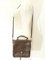 youputitoutthere fake coach D7J-5130 US front.jpg