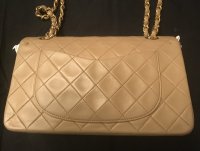 Vintage Chanel - how do you tell if the leather has been retouched