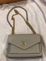 Help! LV LockMe Clutch or MyLockMe BB?