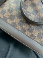 louis vuitton water damage