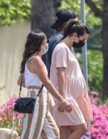 lea-michele-cradles-baby-bump-walk-with-zandy-reich-33.jpg