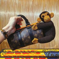 Louis Vuitton Keepall XS Monkey in Coated Canvas with Black/Orange-tone - US