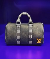 Louis Vuitton Keepall XS Monkey in Coated Canvas with Black/Orange