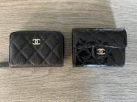 Can't decide between Chanel XL cardholder or Chanel zip coin purse. Anyone  experience wear and tear on the zip?