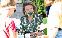 queen-mathilde-in-natan-floral-blouse-and-mask-1.jpg