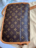 louis_vuitton_vintage_bag_1604825626_08faac25_progressive.jpg