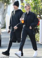 Hailey Baldwin-Beiber YSL Cassandra top handle bag.jpeg